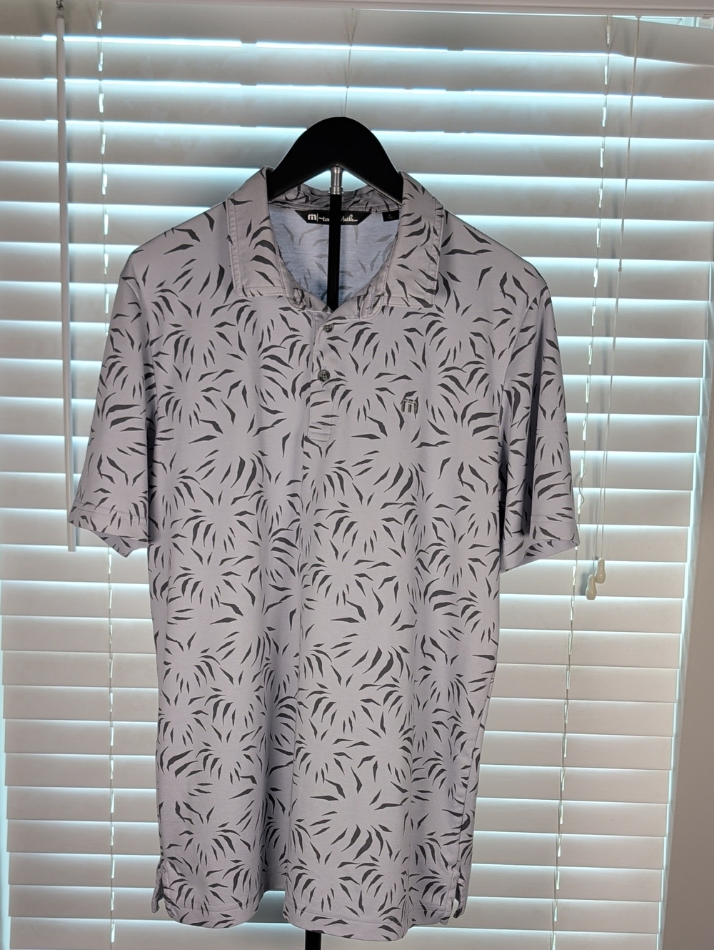 Travis Mathew Light Gray Polo with Black Leaf Print